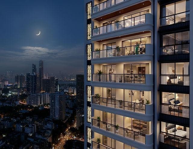 Sunteck BKC Residences tower facade at night with private balconies